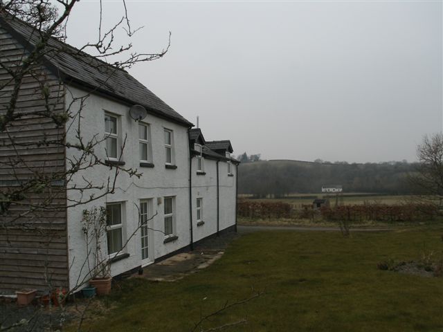 Hendre with Llanysis Church in background.